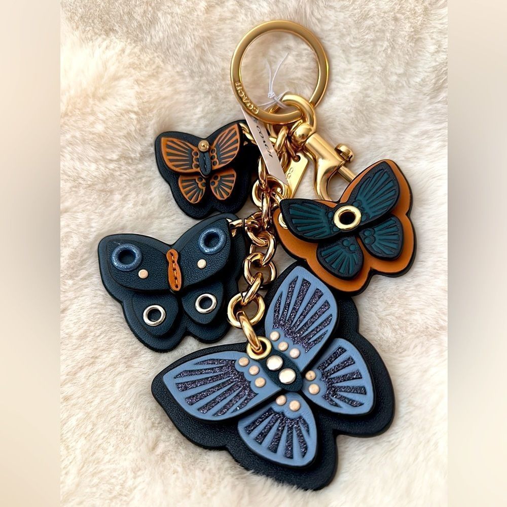 Coach blue leather butterflies keychain